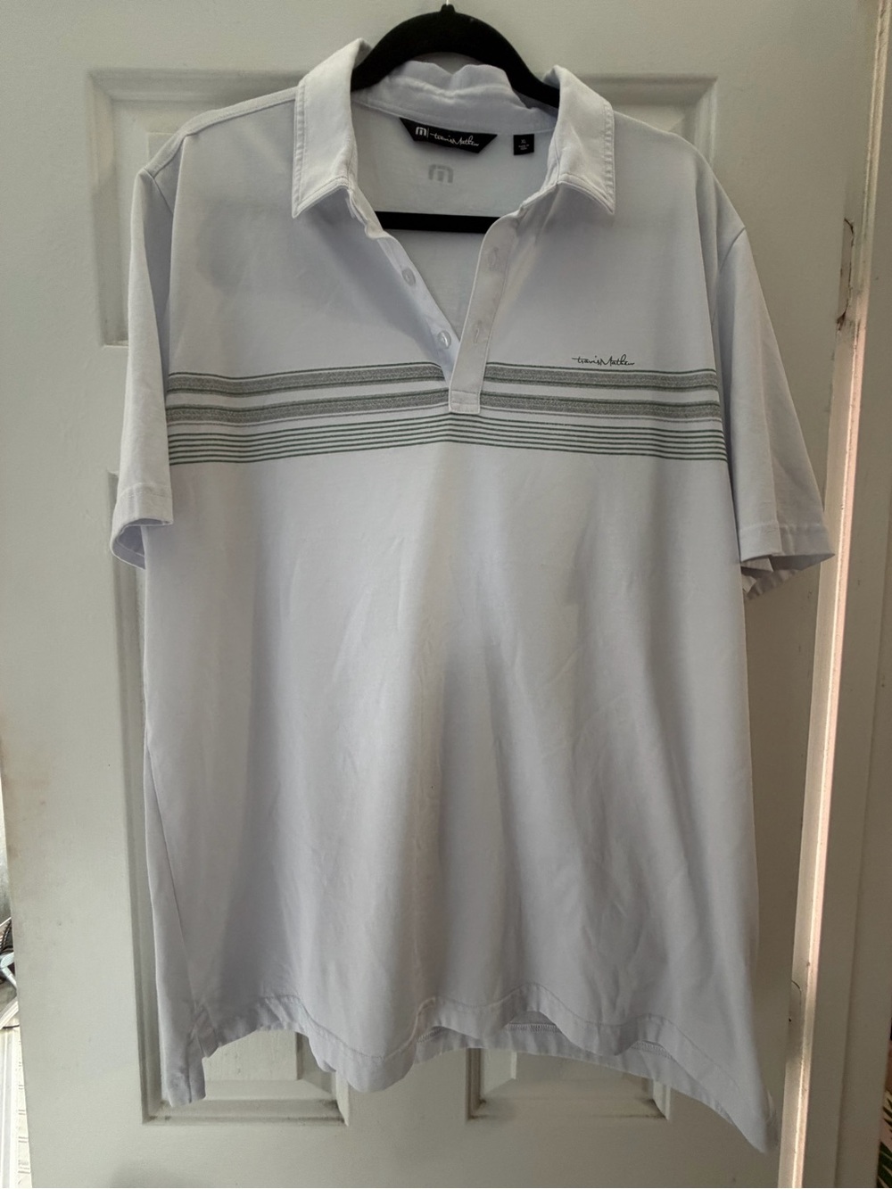 Travis Mathew White Polo with Gray and Green Stripe Detail